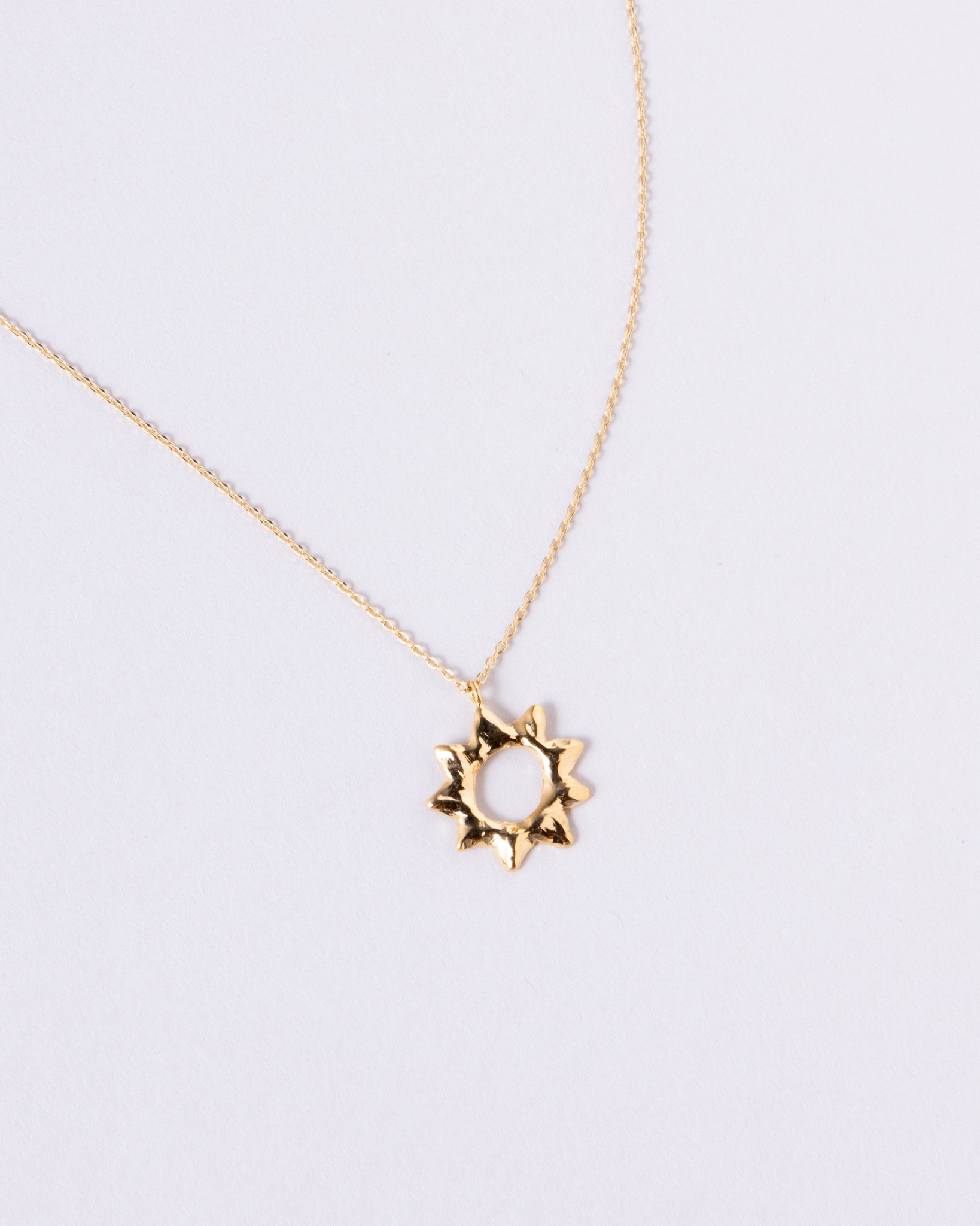 16K Plated Hole Sun Necklace