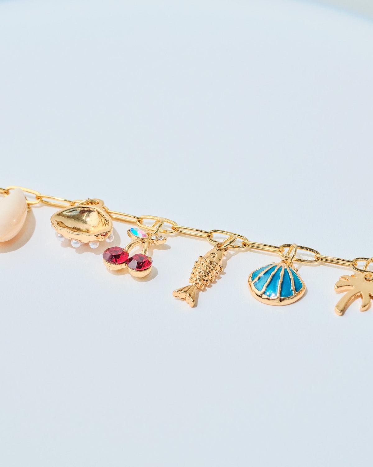 16K Plated Seaside Charms Bracelet