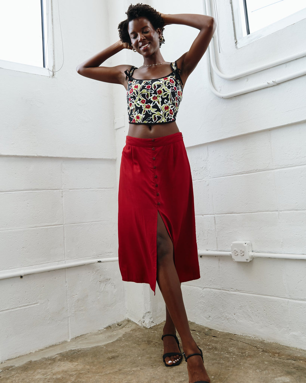 Black shop crop top with red skirt